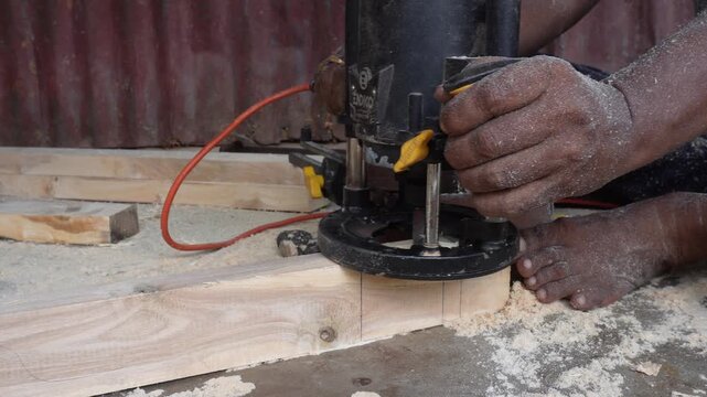 Power wood router shaping smooth edges with precision