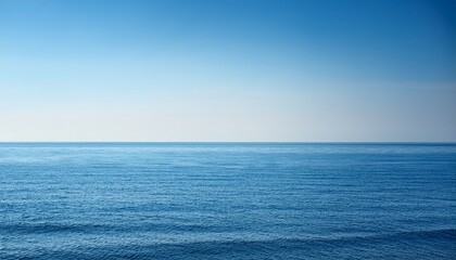 Fototapeta premium A Vast Uninterrupted Seascape Where The Calm Ocean Meets The Pale Cloudless Sky Along A Perfectly Defined Empty Horizon Line Blank Water Ethereal