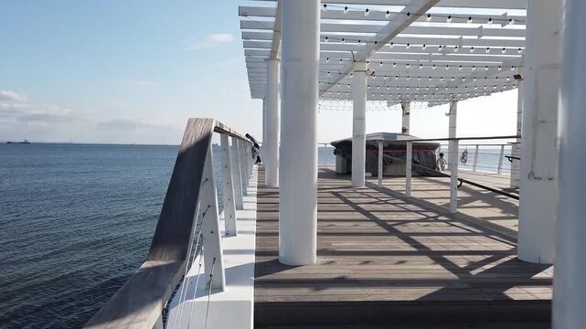 Wooden deck extending to the sea, Chiba, Japan