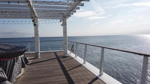 Wooden deck extending to the sea, Chiba, Japan