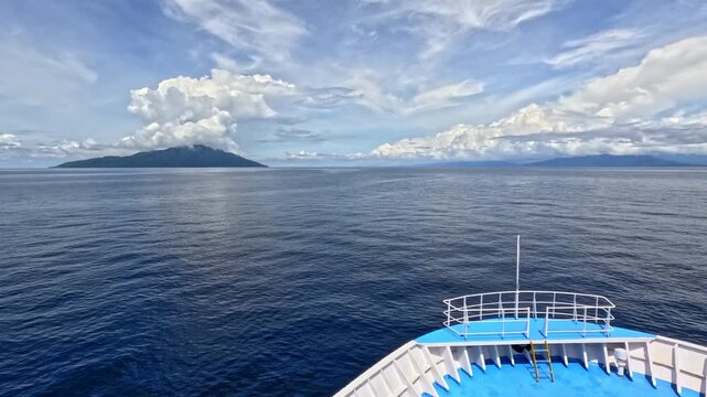 Timelapse Ferry Bow Sailing Toward Volcanic Island, Flores Sea, Indonesia