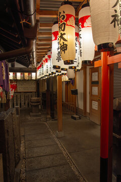 Japanese Paper Lanterns in Traditional Shrine Corridor