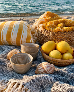 Sunny Beach Still Life With Lemons, Basket, Cups and Striped Blanket