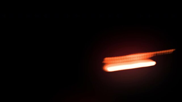 light wife transition with abstract orange streaks and blurs, perfect for motion graphics and visual effects.