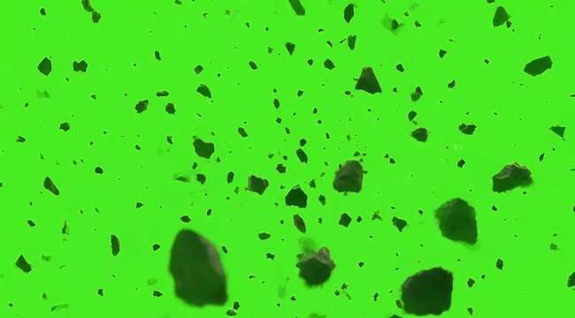 Floating Debris Creating Abstract Scene Against Bright Green Background With Chaotic Atmosphere