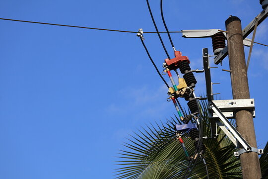 An Electric power transformer on utility pole