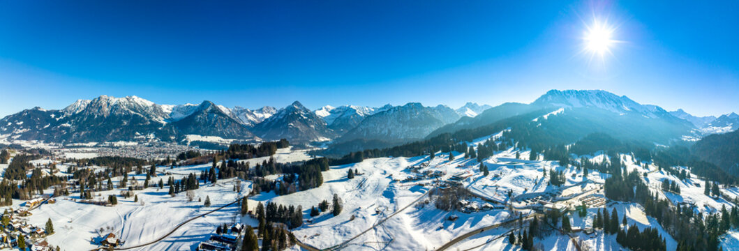 Germany, Bavaria, Oberstdorf, Aerial panorama of Allgau Alps on sunny winter day