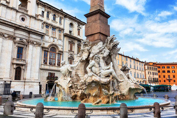 The famous Fountain of the Four Rivers at Piazza Navona in Rome, Italy. Historic Baroque architecture, sculptures and one of the most visited landmarks in Europe. © preto_perola