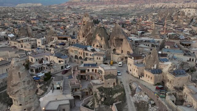 Drone view of G&ouml;reme, a historic town in Cappadocia famous for its fairy chimneys, cave houses and unique volcanic landscape.