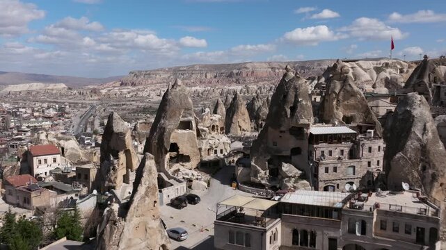 Drone view of G&ouml;reme, a historic town in Cappadocia famous for its fairy chimneys, cave houses and unique volcanic landscape.