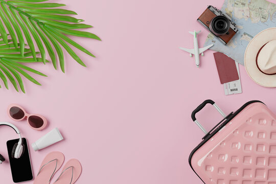 Travel accessories and suitcase flat lay on pink background