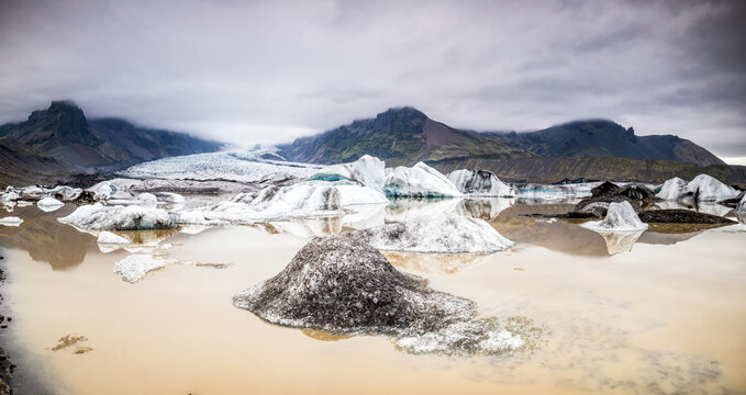 Ash streaked iceberg in Kv��rj�kull lagoon Iceland