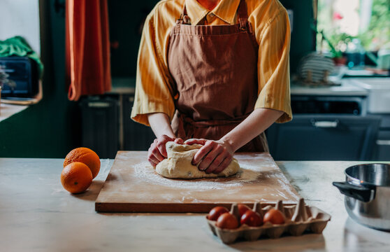 Kneading paska dough for Orthodox Easter in the kitchen