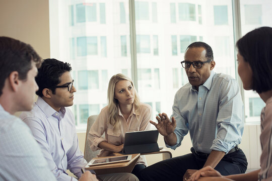 Business people in meeting having interesting discussion