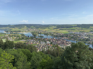 Fototapeta premium Aerial View of a Historic Town and River in Switzerland