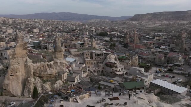 Drone view of G&ouml;reme, a historic town in Cappadocia famous for its fairy chimneys, cave houses and unique volcanic landscape.