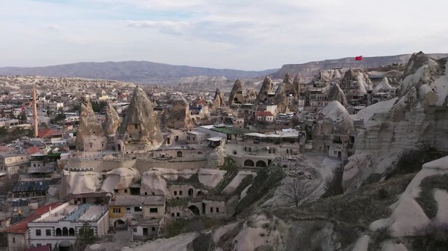 Drone view of G&ouml;reme, a historic town in Cappadocia famous for its fairy chimneys, cave houses and unique volcanic landscape.