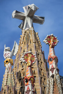 La Sagrada Familia - impressive cathedral designed by Gaudi. Tower, dedicated to Jesus Chris with huge three-dimensional four-pointed cross. BARCELONA, SPAIN.