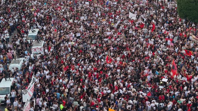 Close Aerial Footage of Tirana Demonstrators, about Zvernec case and saving Flamingos, also asking prime minister resignation