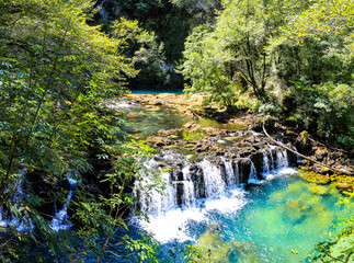 Source of Una River waterfall with turquoise water and travertine cascades near Bihac Bosnia and Herzegovina © Mario