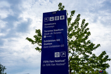 Naklejka premium FIFA Fan Festival directional sign in Toronto park area. Toronto, Canada - June 9, 2026.