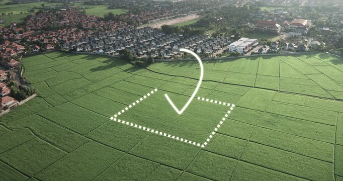 Aerial drone footage of land with location marker and boundary overlay, representing land for sale, property investment, real estate opportunity, land parcel identification and GIS mapping.