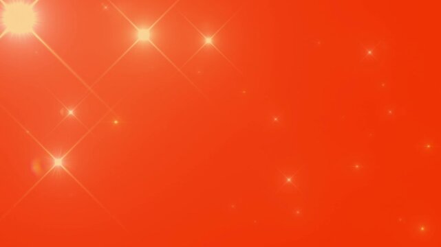 A vibrant solid orange background is decorated with glowing yellow starbursts and tiny twinkling light flares clustered mostly on the left side creating a festive celebration mood