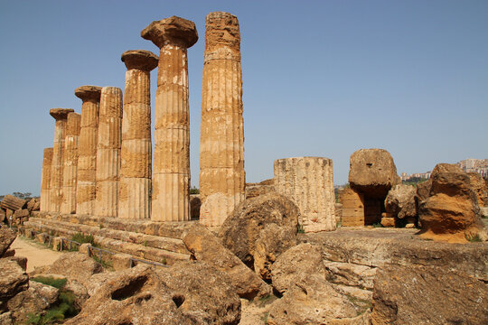 ruined ancient (greco-roman) temple (hercules temple) at the valley of temples in agrigento in sicily in italy