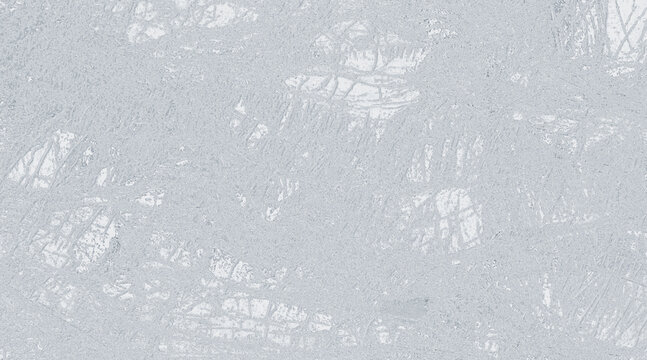 Abstract pattern of fine grey threads creating a delicate, intricate web against a soft, blurred background. This textural image evokes a sense of fragility and complexity