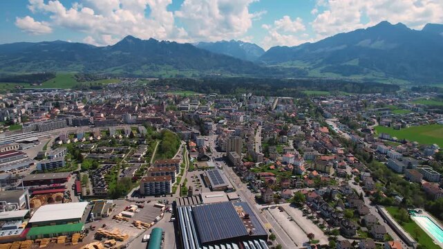 An aerial view beside the city and e old town of Bulle in Switzerland on a sunny noon in spring.