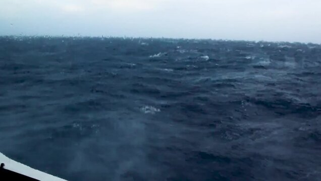Video with amateur noises A ship in a storm at sea, a view from the window of a high wave wreck of a ship. Waves in the sea in the window of the ship