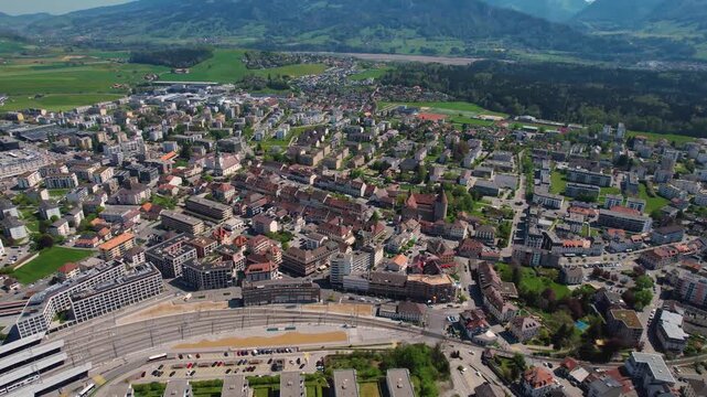 An aerial view beside the city and e old town of Bulle in Switzerland on a sunny noon in spring.