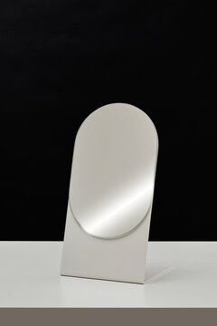 Abstract close-up of  silver metallic mirror with circular shape