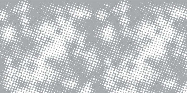 Abstract gray and white halftone dots background. Modern pop art pattern with dynamic geometric circle texture for banner, print, and backdrop.