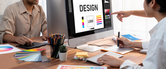 Graphic designer software for modern design of web page and commercial brisk ads showing on the computer screen © InfiniteFlow