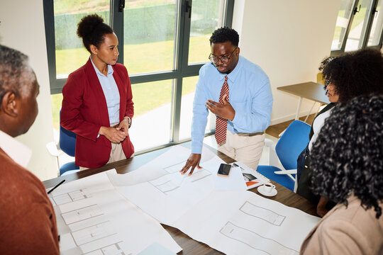 Team Evaluates Project Approaches