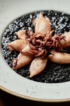 Black risotto with squid