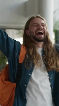 Emotional happy excited Caucasian student guy man winning mobile phone app discount e-commerce male win smartphone loud yelling studying motivated learning education successful victory in university
