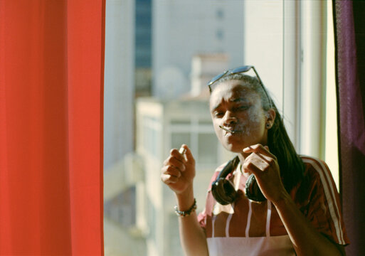 Smoking By Window