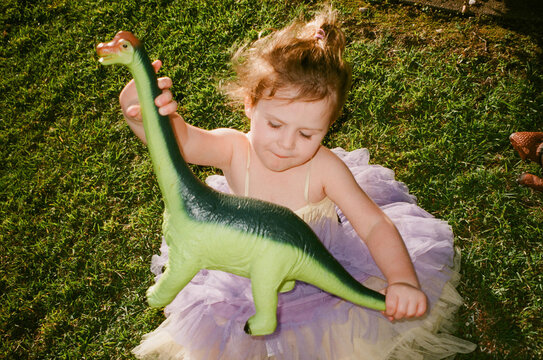 Young girl playing in Australian Front Yard on Film