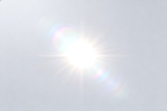 Bright sun in clear sky