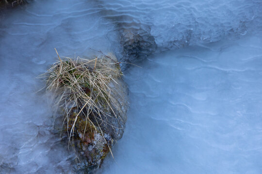 Ice formations on the mountain slopes in a sunny winter day. A wintertime scenery in Geiranger Unesco World heritage area, Sunnmore, More og Romsdale, Norway.