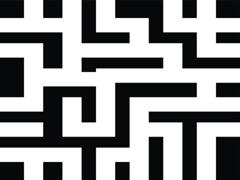 Close up view of intricate black and white labyrinth pattern creating a complex maze design.