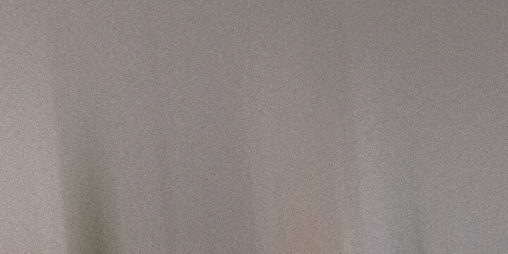 Heavy rain falling on a foggy window with blurred outdoor view