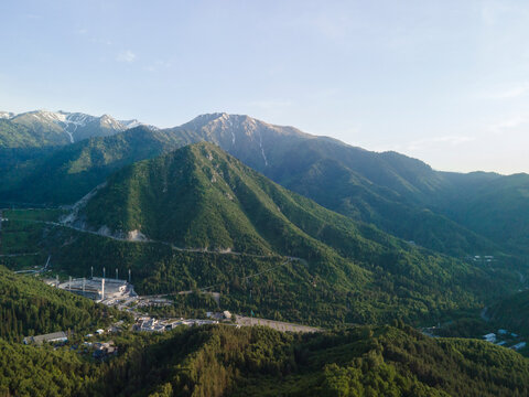 Aerial view of Medeu ice rink and winding road in Tian Shan mountains near Almaty