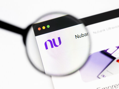 Milan, Italy 2026, 20 Apr Closeup of Nu Holdings website on a laptop screen. Nu Holdings logo under a magnifying glass.