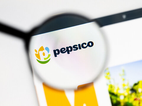 Milan, Italy 2026, 20 Apr Closeup of PepsiCo website on a laptop screen. PepsiCo logo under a magnifying glass.