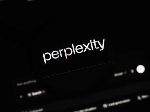 Milan, Italy 2026, 20 Apr Closeup of Perplexity AI website on a laptop screen. Perplexity AI logo under a magnifying glass.
