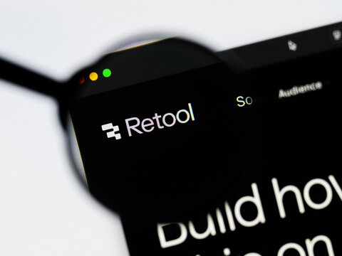 Milan, Italy 2026, 20 Apr Closeup of Retool AI website on a laptop screen. Retool AI logo under a magnifying glass.