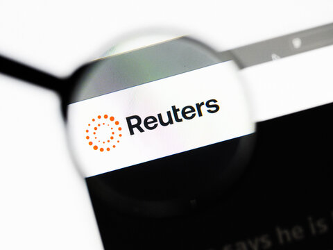 Milan, Italy 2026, 20 Apr Closeup of Reuters website on a laptop screen. Reuters logo under a magnifying glass.